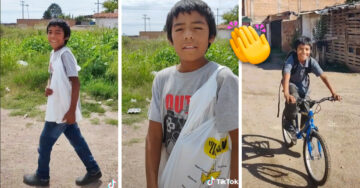 Niño recibe una mochila y una bicicleta para ir a a escuela y su sonrisa lo dice todo